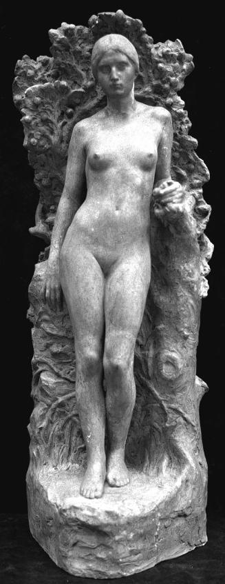 Female Nude Standing in front of Tree