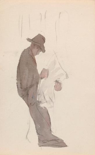 A Man Reading a Newspaper